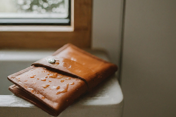 Leather Wallet with water on it.